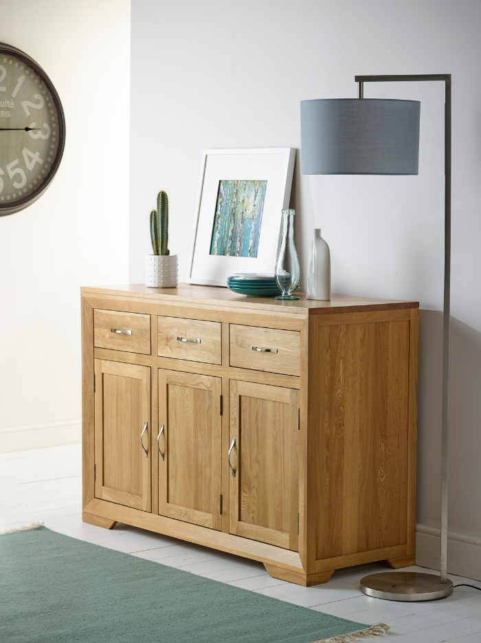 Bevel cupboard with grey floor lamp 