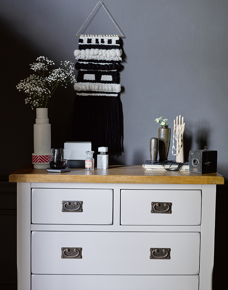 Grey painted chest of drawers with scandi accessories